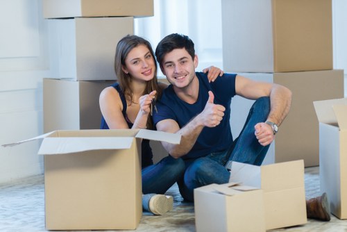 Packed household items and labels during a Catford relocation