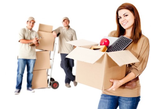 Packed boxes and furniture secured inside a removal truck